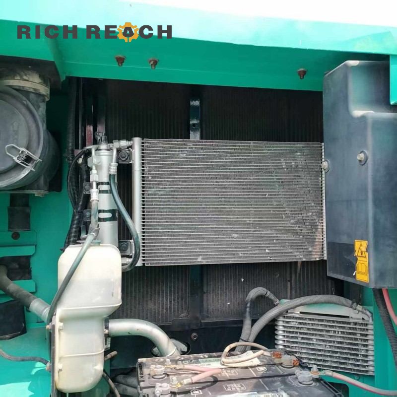Counterweight and engine cover of a 2017 Kobelco SK130LC excavator, 500 hours, $20,833